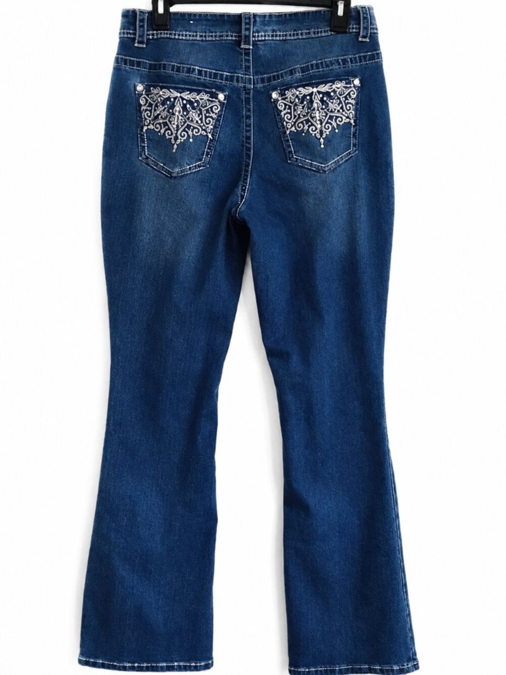 Size 10 denim jeans. Faded bootcut "Curvy" long blue pants.  Country Casual